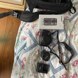 NWOT Canon Rebel T7 camera with extra lens and bag